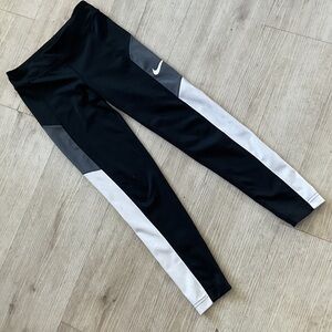 Nike woman’s tight fit Black and White Leggings size medium